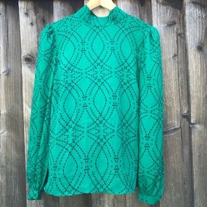 Eva Longoria green blouse